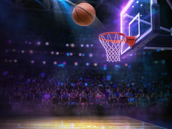 jjjpk Basketball approaching a hoop in a brightly lit arena